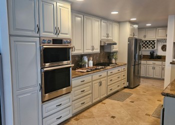 "Canvas Tan" painted maple with grey glaze.