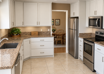 Sheer Beauty Refacing with current Granite Countertops Sheer Beauty Thermofoil complements the existing granite countertops.