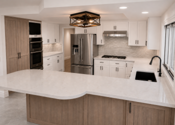 RTF Cabinet Refacing + New Countertops Two-tone RTF refacing with satin white cabinets, a driftwood-look peninsula and white quartz countertops