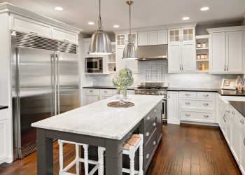 Beautiful Refaced Cabinetry and Custom Island in this luxury home.